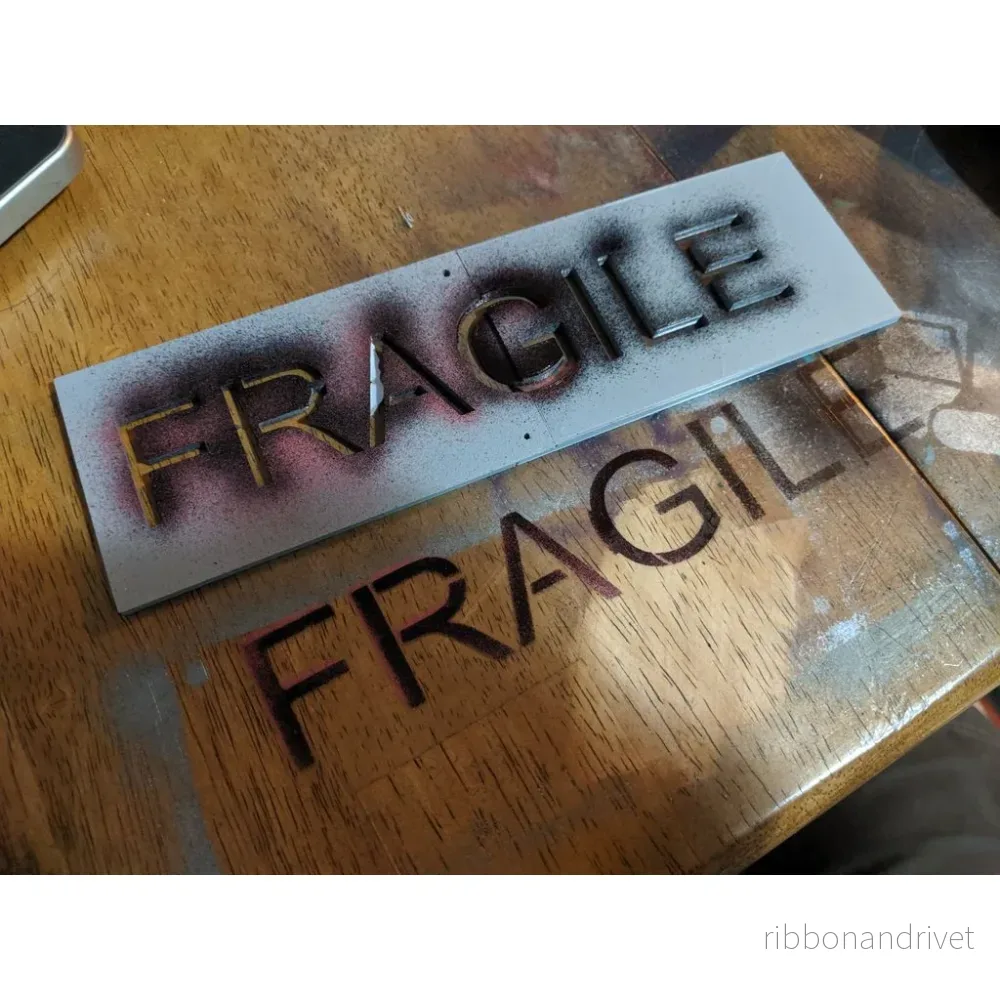 FRAGILE mall för märkning av fraktkartonger