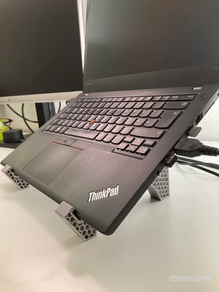 Ergonomiskt upphöjt stativ för bärbar dator