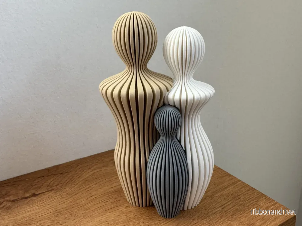 Familjeskulptur med 1 barn - Bild 3