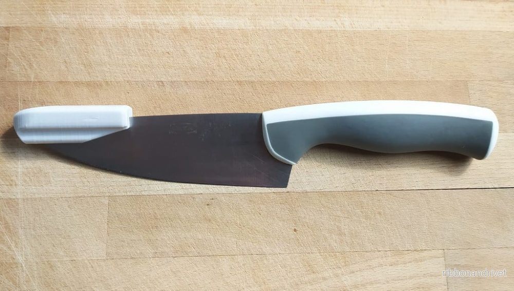 Avtagbart extra handtag för kniv