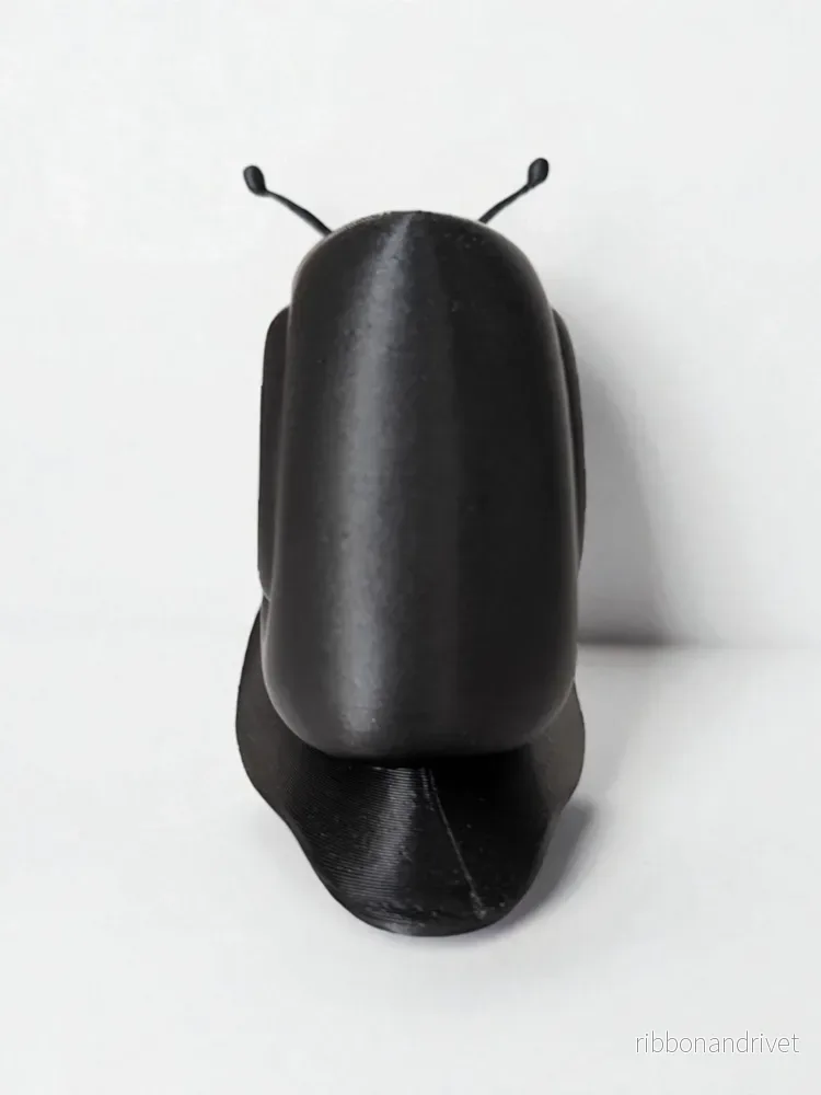 Minimalistisk snigelskulptur för modern inredning - Bild 2