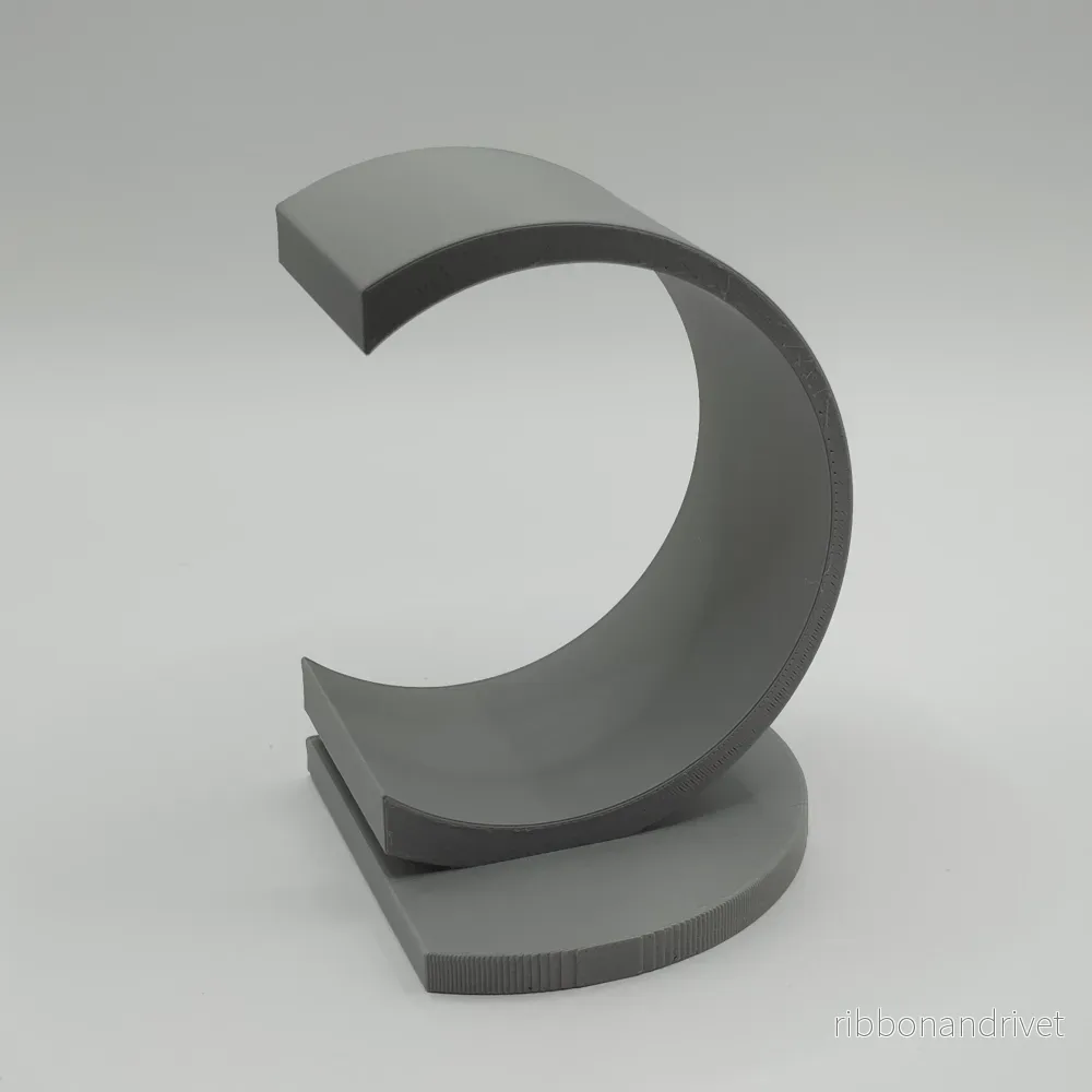 Modern cirkulärt bokstöd i minimalistisk design