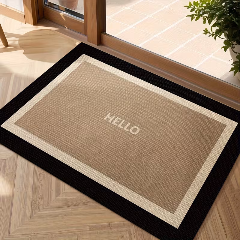 Dörrmatta beige och svart med hello text 40x60cm Dörrmatta beige och svart med hello text 40x60cm