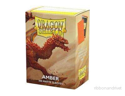 Dragon Shield Standard Matte Sleeves – Amber (100 Sleeves) Dragon Shield Standard Matte Sleeves – Amber (100 Sleeves)