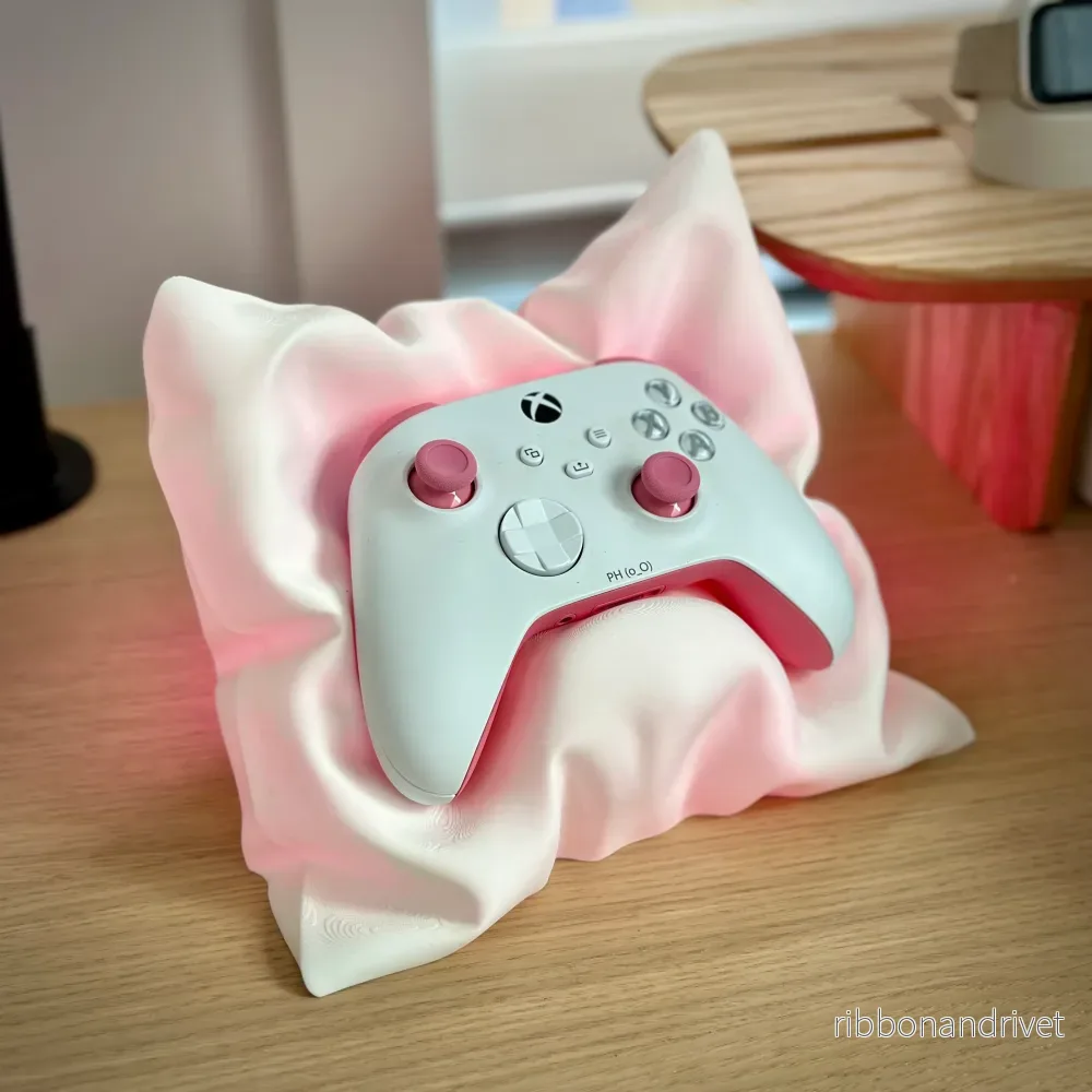 Puddelformad ställ för Xbox och Switch-kontroller