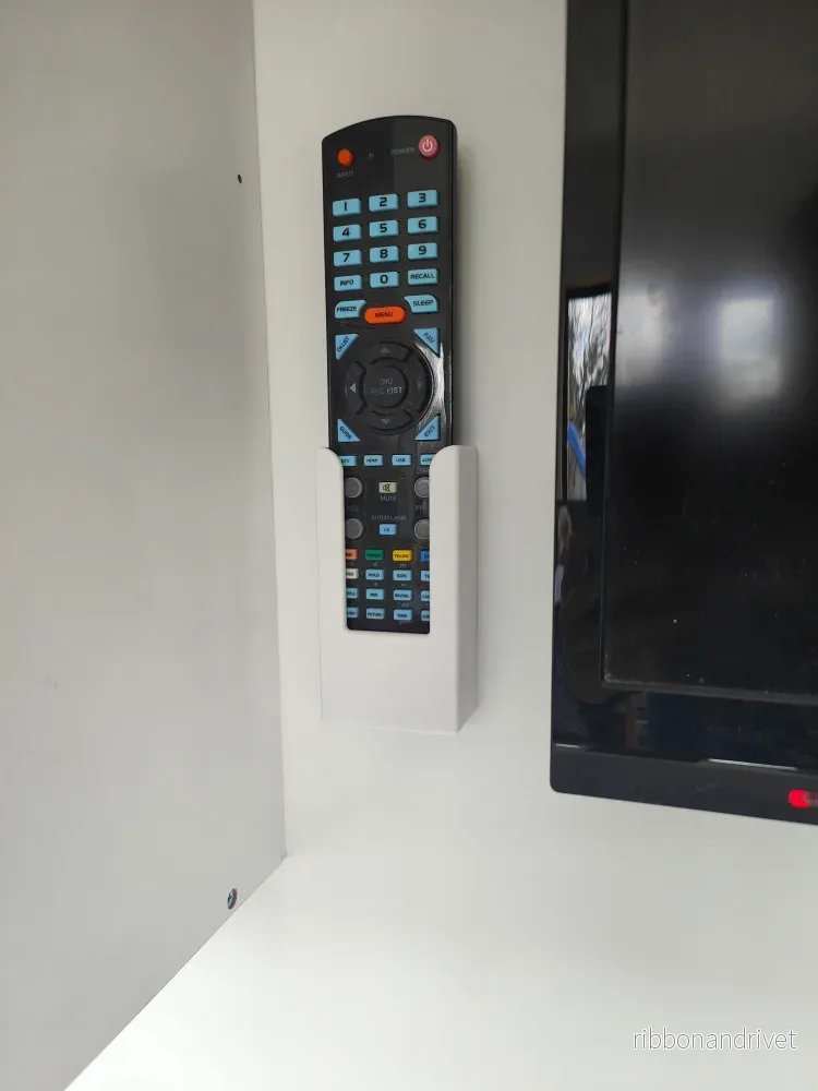 Väggmonterad Konka TV-fjärrkontrollhållare Väggmonterad Konka TV-fjärrkontrollhållare