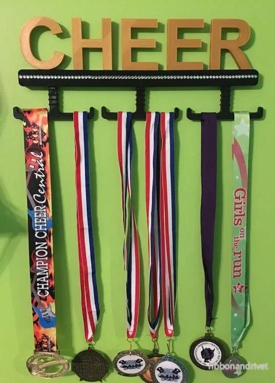 Väggmonter för cheerleadingmedaljer (10 stycken)