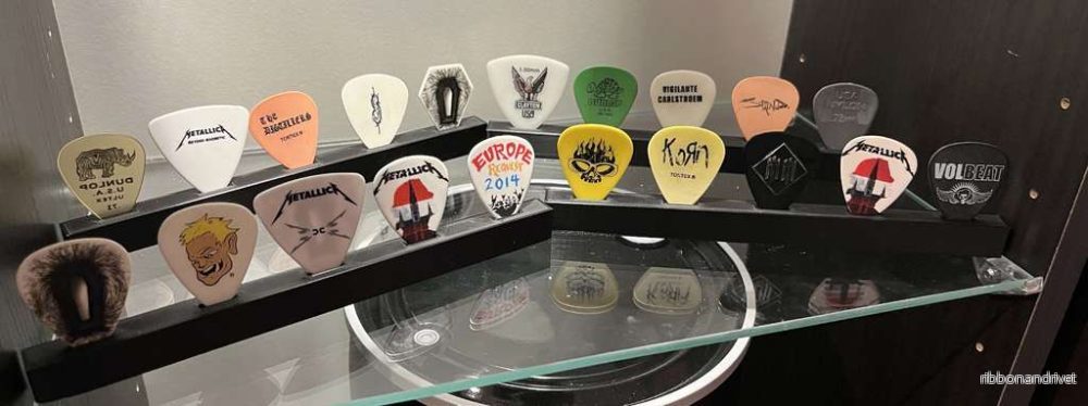 Hållare för gitarrplektrum