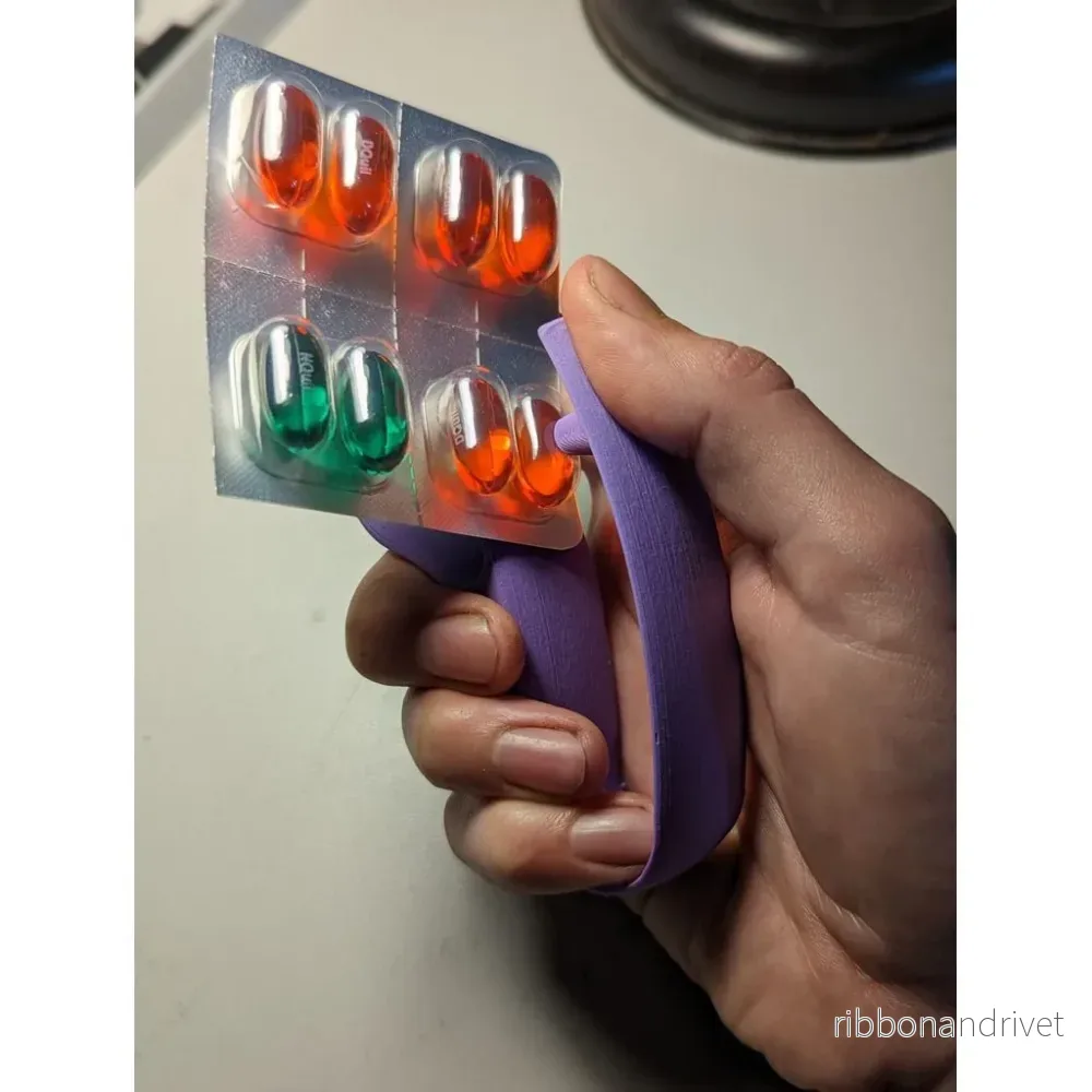 Ergonomisk pilleröppnare för medicin i blisterförpackningar Ergonomisk pilleröppnare för medicin i blisterförpackningar