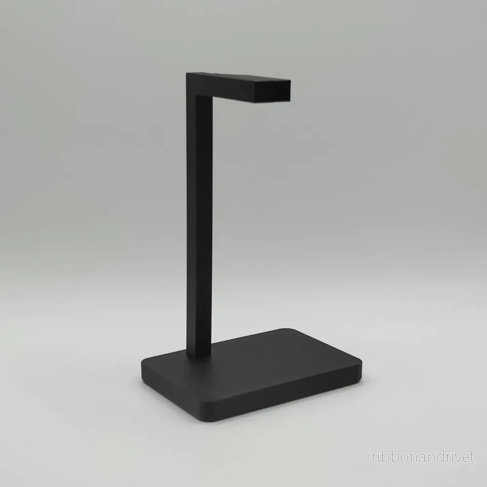 Minimalistiskt stativ för hörlurar och headset