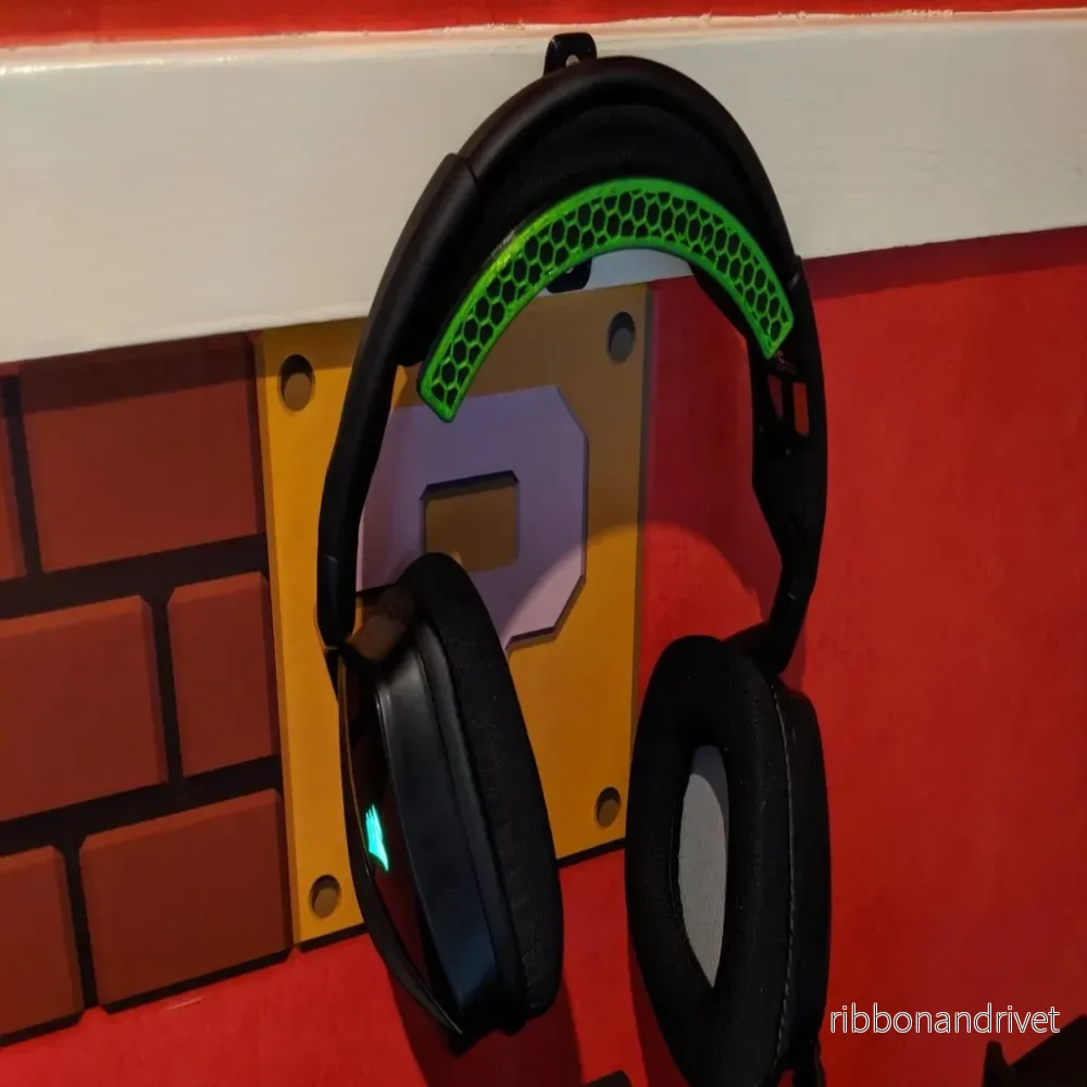 Bred väggmontering för hörlurar och headset