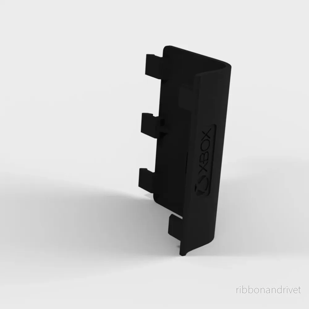 Xbox-batterilock med logotyp och utmatningsknapp Xbox-batterilock med logotyp och utmatningsknapp