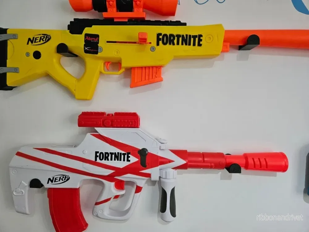 Set med 3 Nerf Gun väggfästen med 4,5 mm hål Set med 3 Nerf Gun väggfästen med 4,5 mm hål
