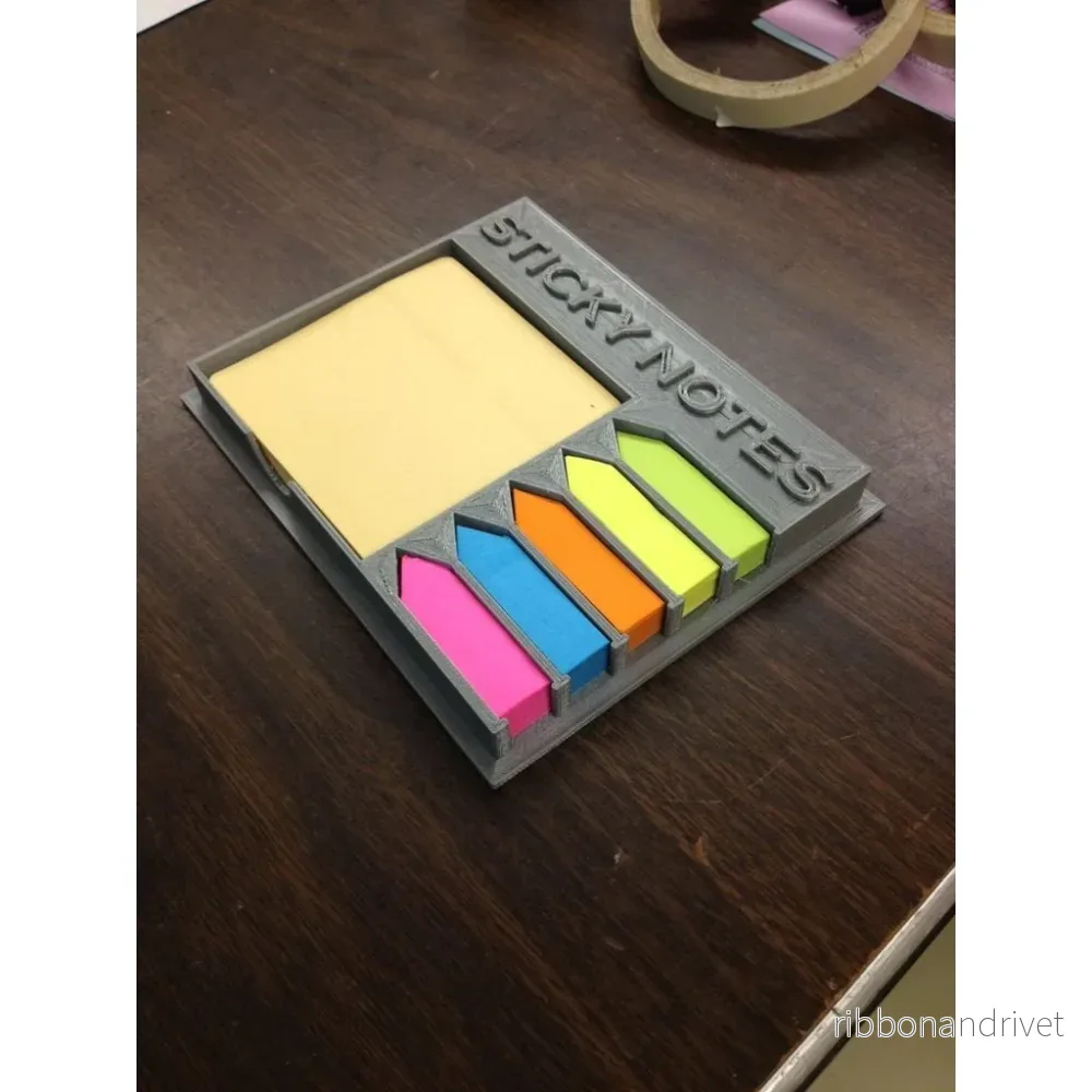Praktisk hållare för sticky notes och sidmarkörer