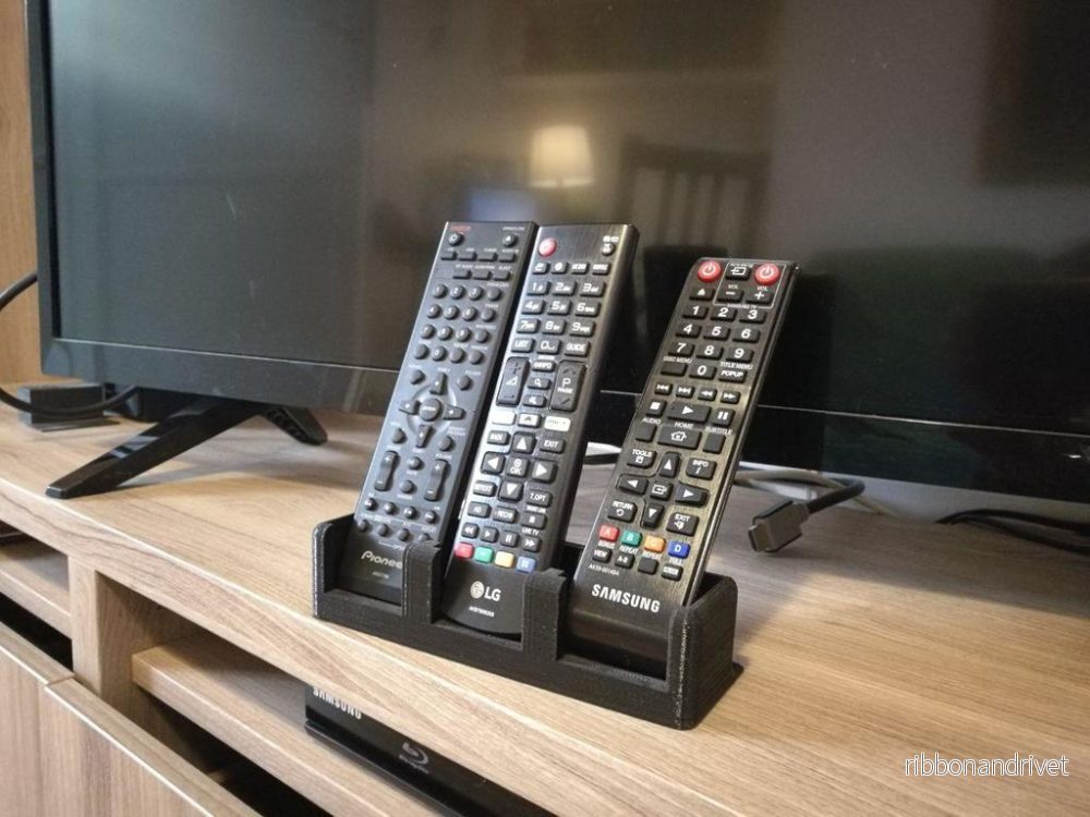 Elegant och universell fjärrkontrollhållare för TV Elegant och universell fjärrkontrollhållare för TV
