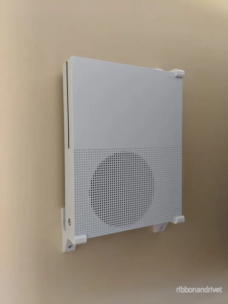 Väggfäste för Xbox One S/X – Platsbesparande och säker montering Väggfäste för Xbox One S/X – Platsbesparande och säker montering